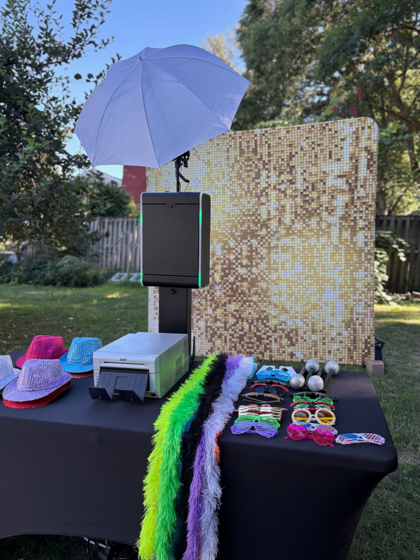 Outdoor photo booth setup with props